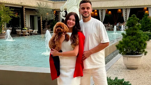 Вайбове фото Демченків: брюнетка довірливо застрибнула на руки в центрі Буковелю